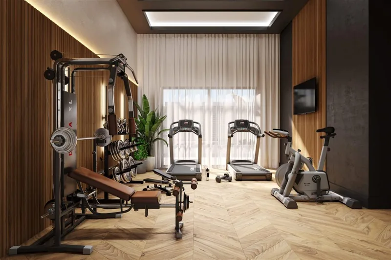 Academia com esteiras, bicicleta e estação de musculação